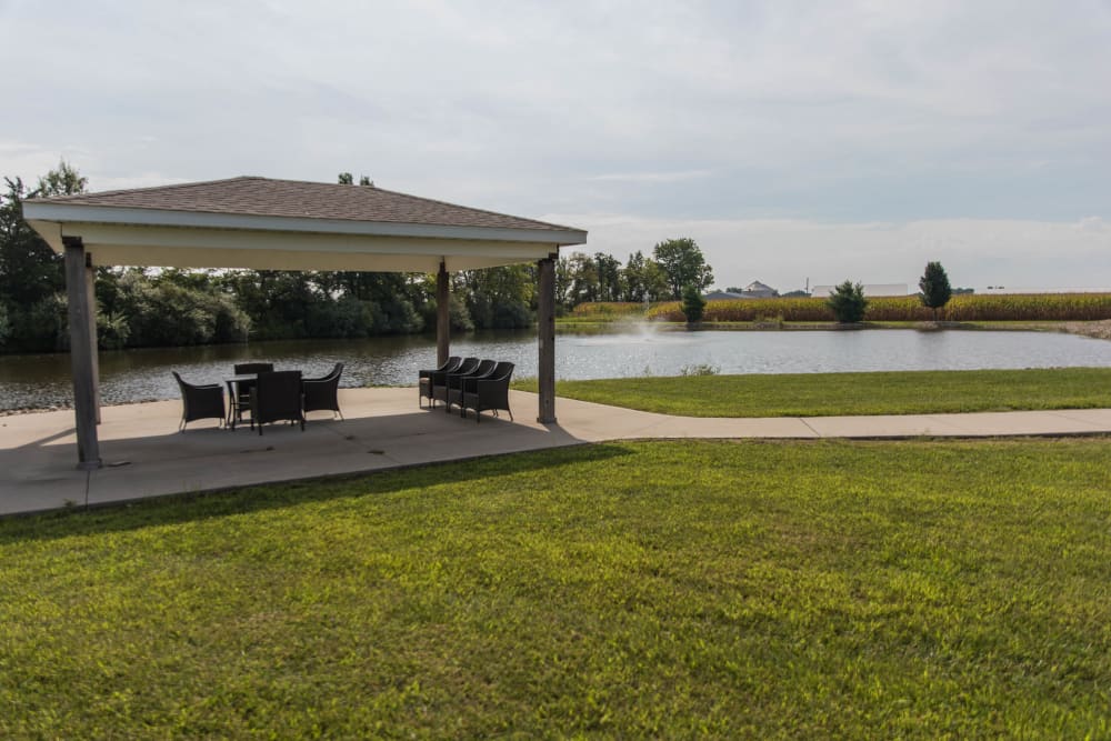 Covered pavilion by the water at Villas of Holly Brook Marshall in Marshall, Illinois