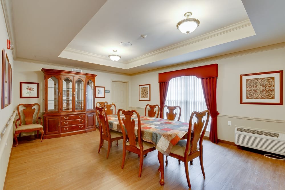 Dining room with red accents at Brentwood at Hobart in Hobart, Indiana