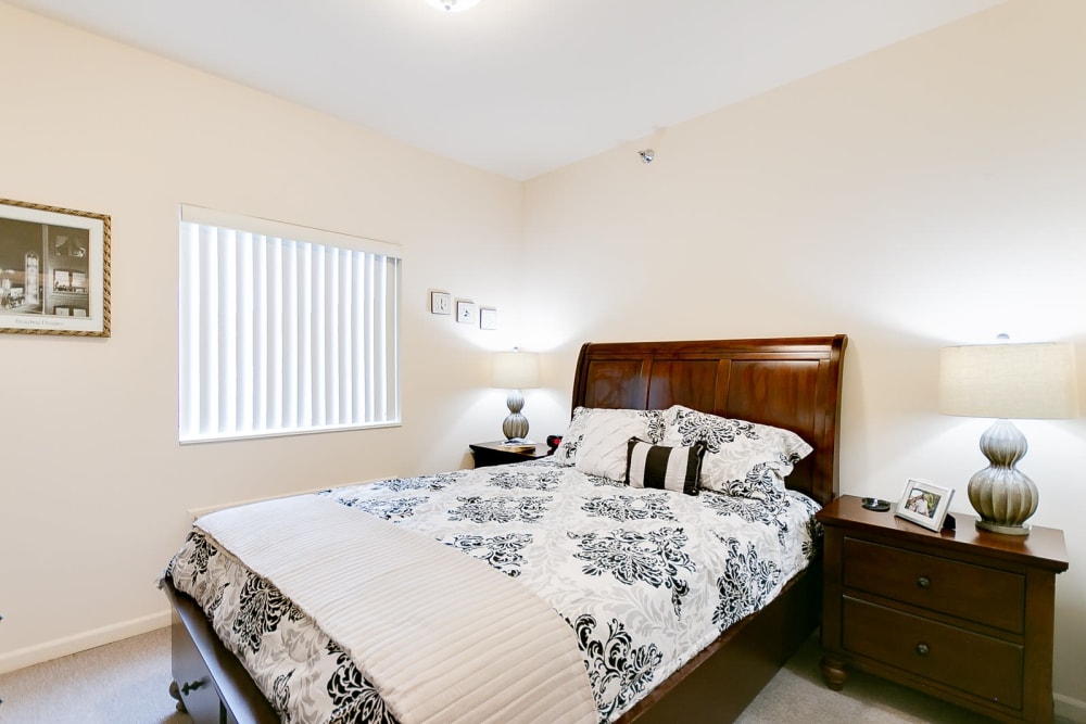 Bedroom model with blue accents at Brentwood at Hobart in Hobart, Indiana