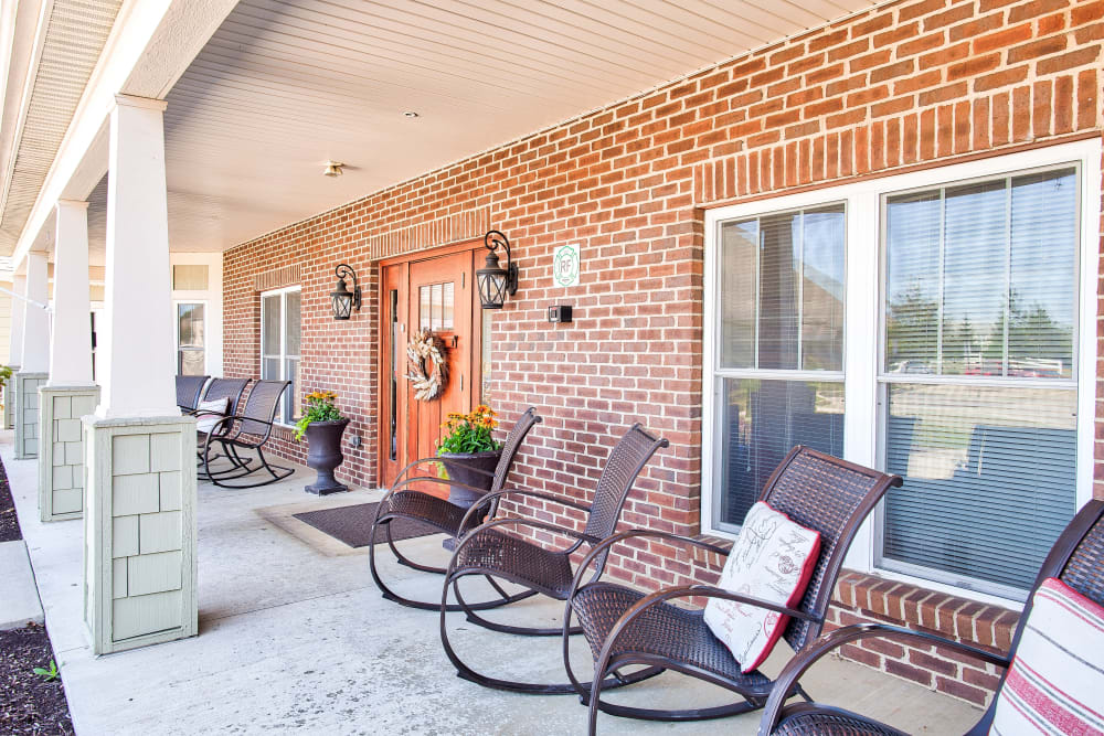 Front entrance with patio chairs at Landings of Huber Heights in Huber Heights, Ohio