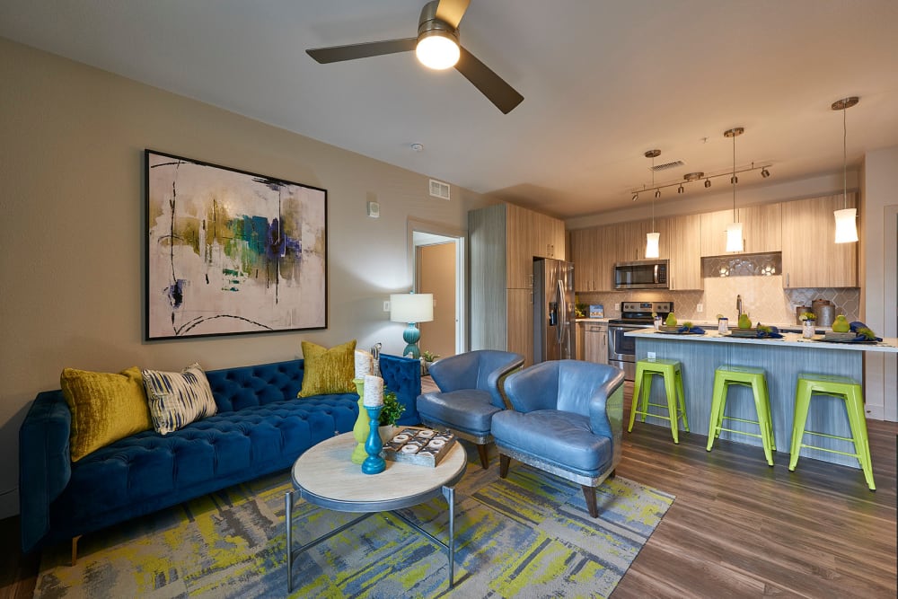 Spacious, bright living room at Encore Evans Station in Denver, Colorado