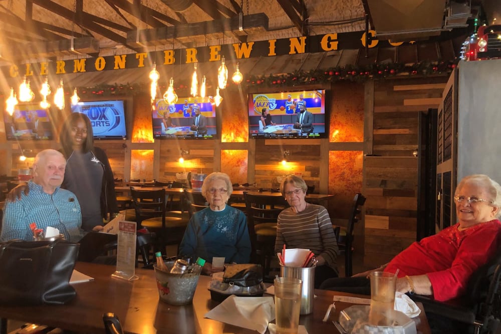 Residents in a restaurant near Inspired Living Ocoee in Ocoee, Florida