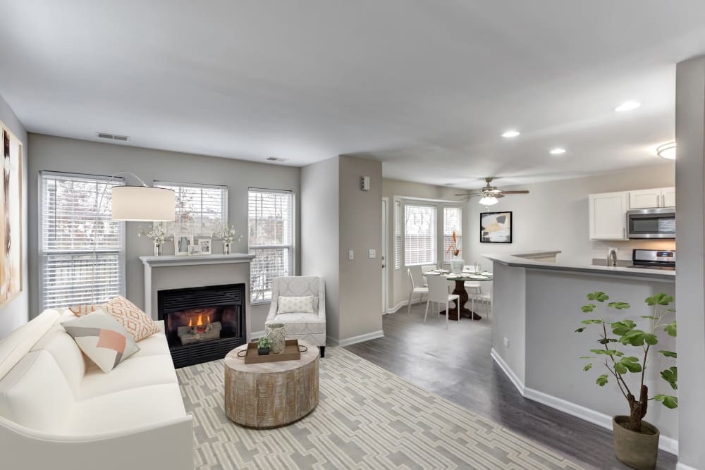 An apartment living room with fireplace at Lakeview Townhomes at Fox Valley in Aurora, Illinois