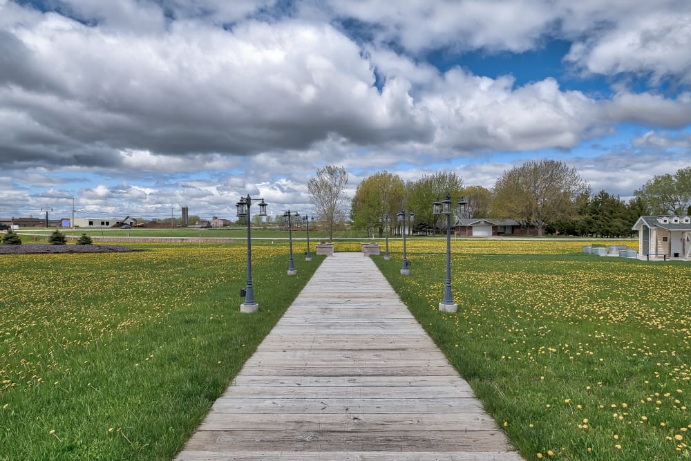 Landscaping and a walkway at The Landings of Kaukauna in Kaukauna, Wisconsin