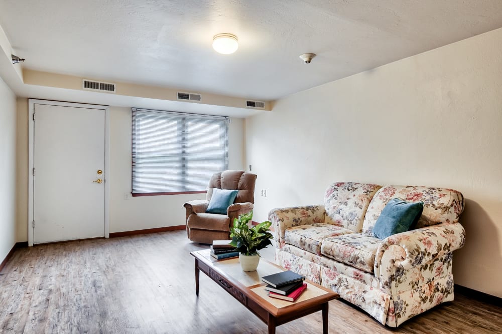 A spacious sunlit living room at Birch Creek in De Pere, Wisconsin