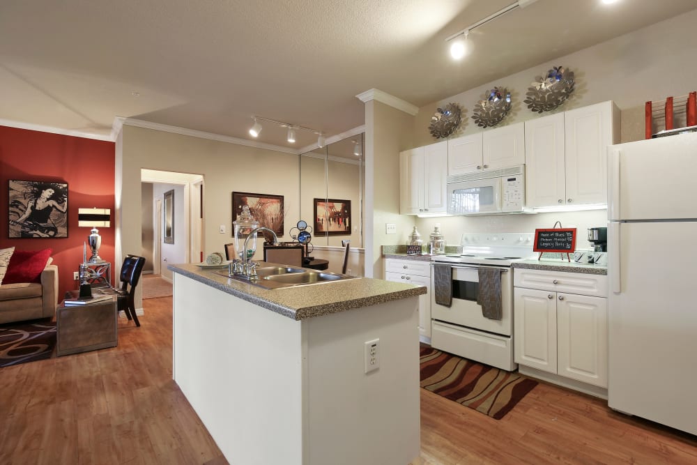 Spacious, fully equipped kitchen at The Lyndon in Irving, Texas