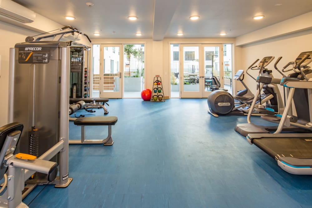 Well-equipped onsite fitness center at EVIVA Midtown in Sacramento, California