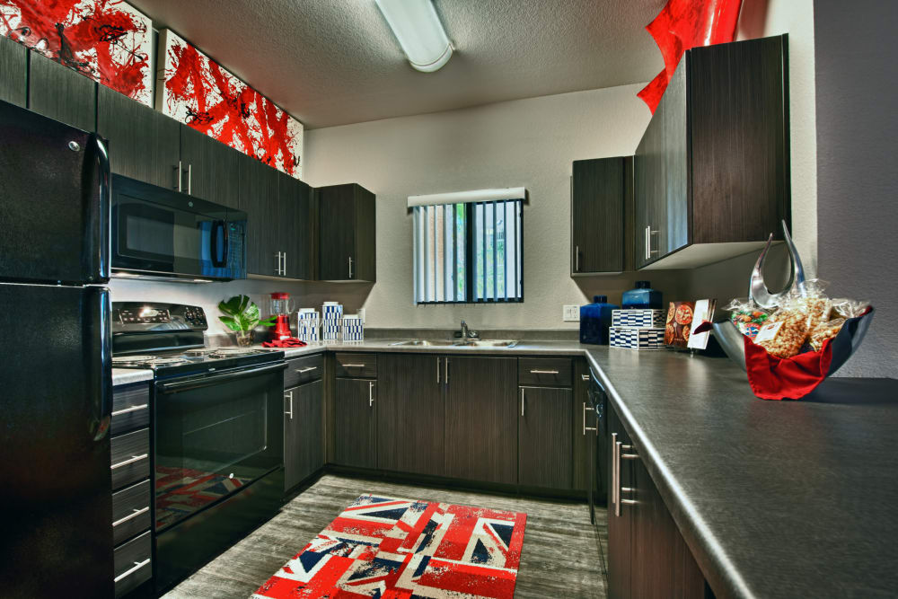 Gourmet kitchen in model home at Avenue 25 Apartments in Phoenix, Arizona