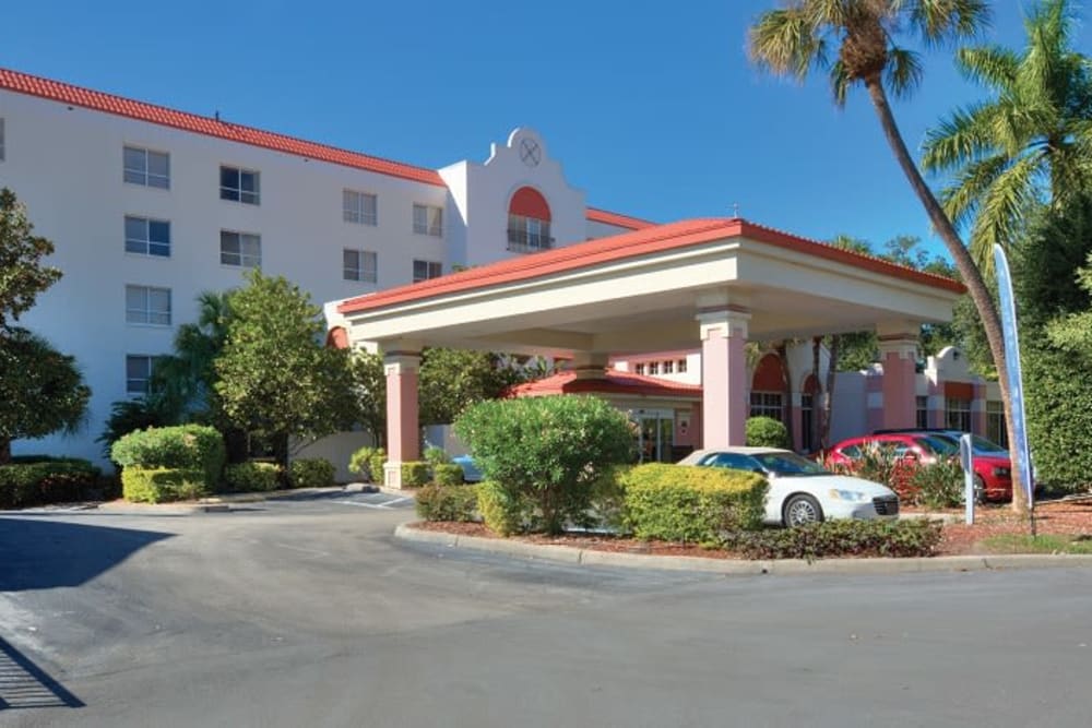 The exterior of the main entrance at Grand Villa of Sarasota in Sarasota, Florida
