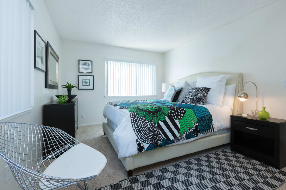 Colorfully decorated bedroom in a model home at Waterstone Fremont in Fremont, California