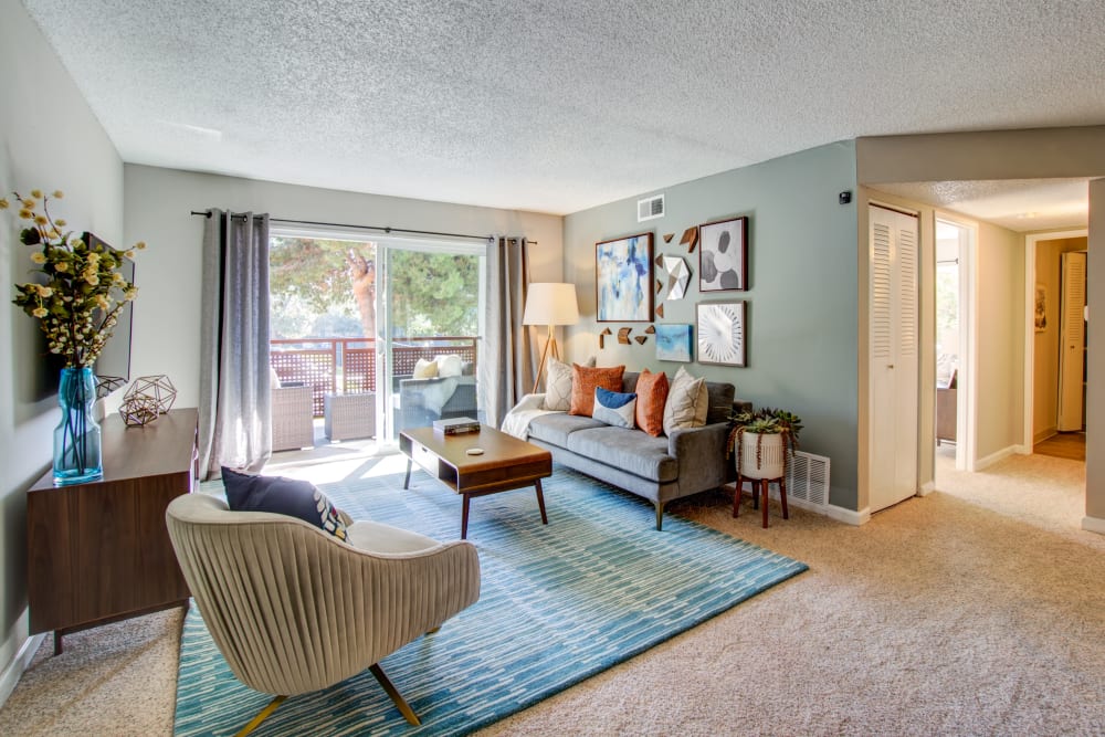 Sliding doors to the private patio outside a model home's living area at Waterstone Fremont in Fremont, California