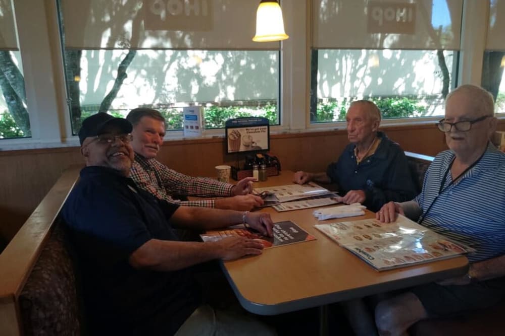 Residents enjoying a meal out near Inspired Living Bonita Springs in Bonita Springs, Florida. 