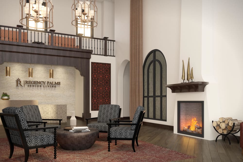 Main lobby with a fireplace and large reception area at Regency Palms Oxnard in Oxnard, California