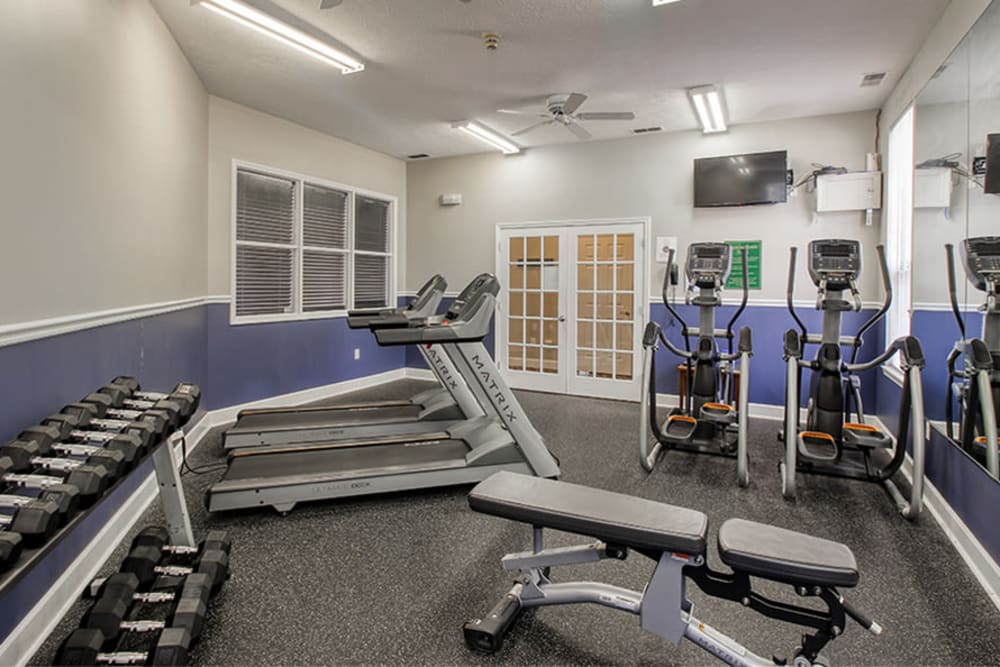 Fully equipped fitness center at Webster Green in Webster, New York