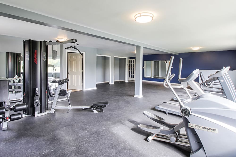 Well-equipped fitness center at High Acres Apartments & Townhomes in Syracuse, New York