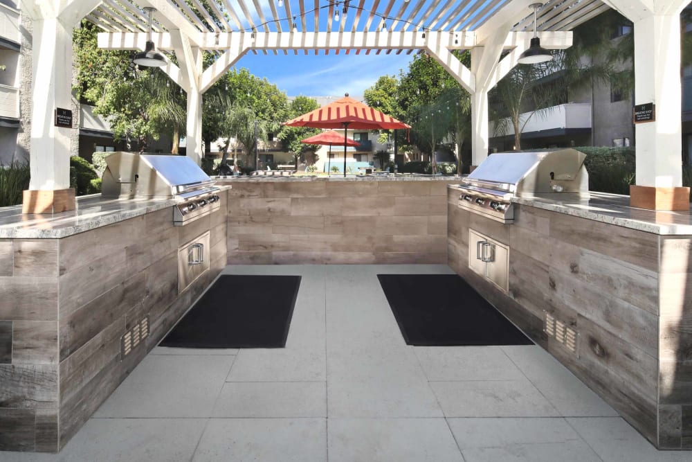 Shaded seating near the barbecue area at Haven Warner Center in Canoga Park, California