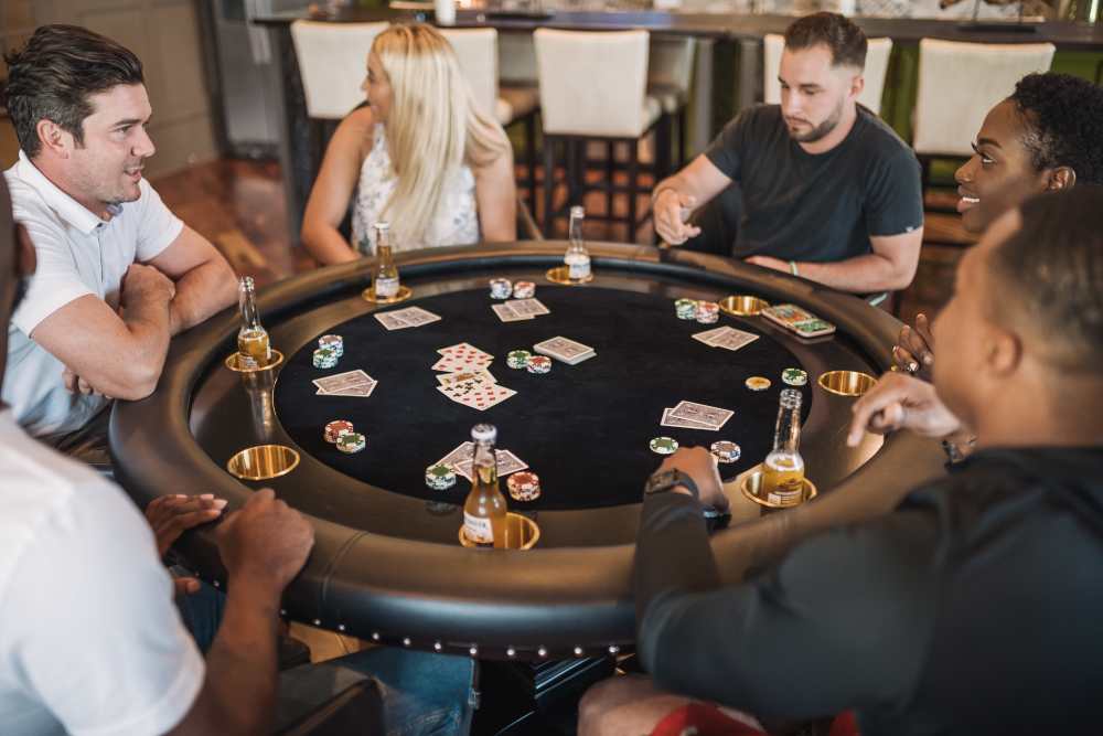 Residents playing poker in the game room at Springfield Apartments in Murfreesboro, Tennessee