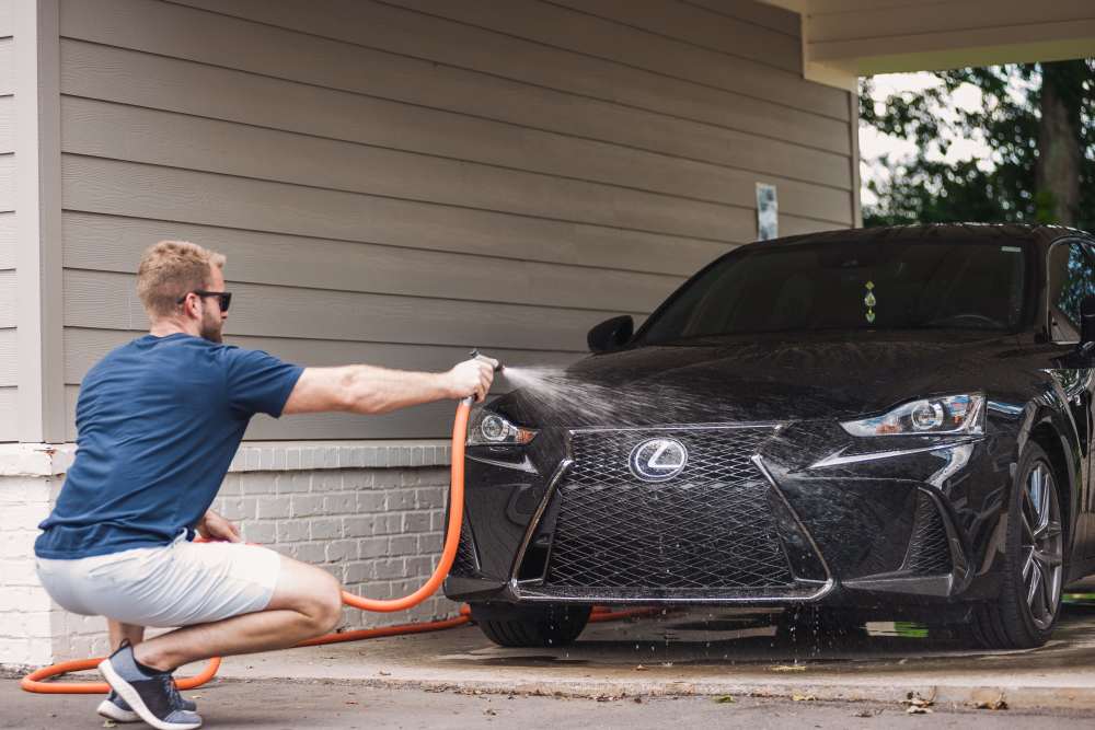 Resident using the car care station at Springfield Apartments in Murfreesboro, Tennessee