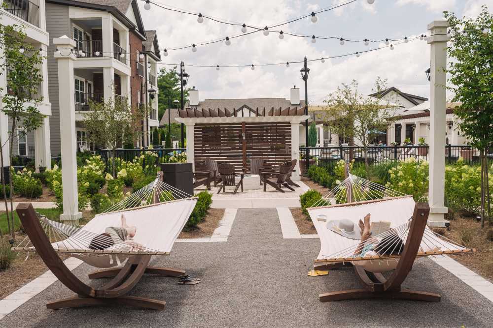 Courtyard with string lights and lounge seating at Springfield Apartments in Murfreesboro, Tennessee