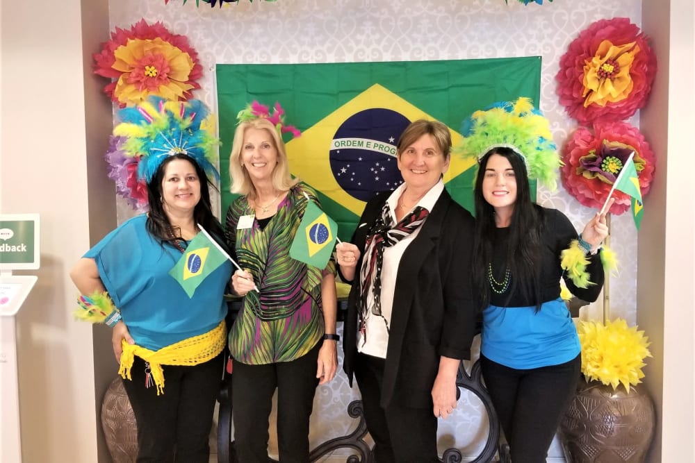 Group of staff all dressed up at Inspired Living Delray Beach in Delray Beach, Florida. 