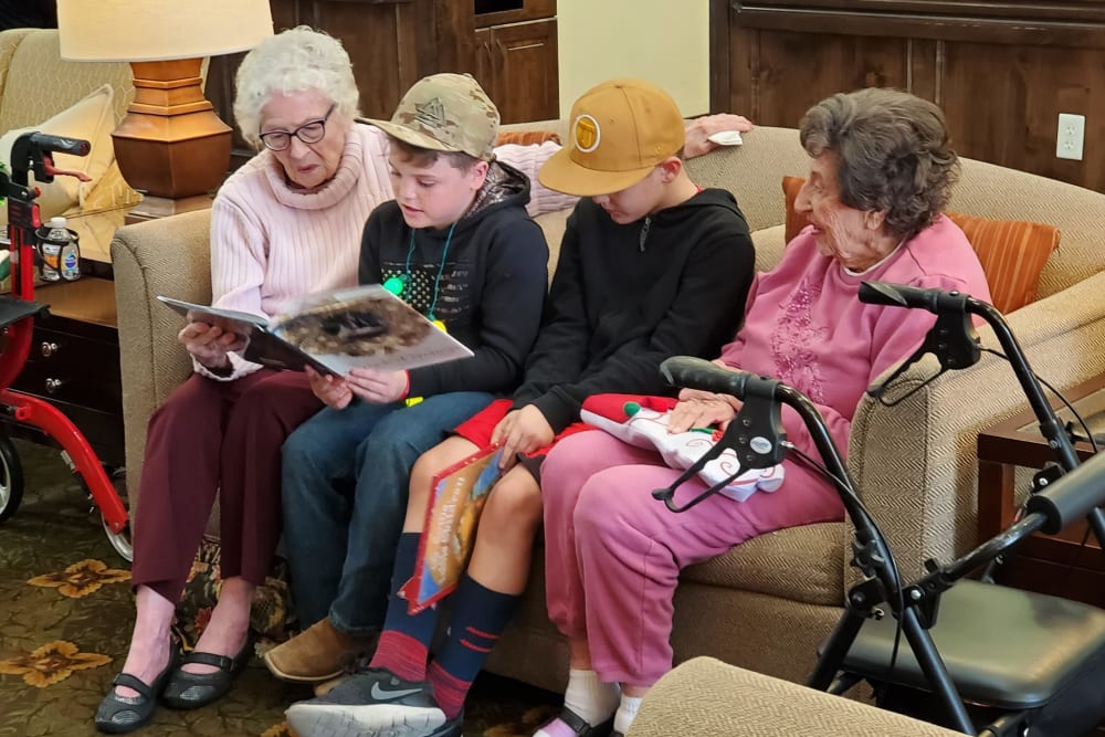 Children visiting with residents at The Retreat at Sunriver in St. George, Utah