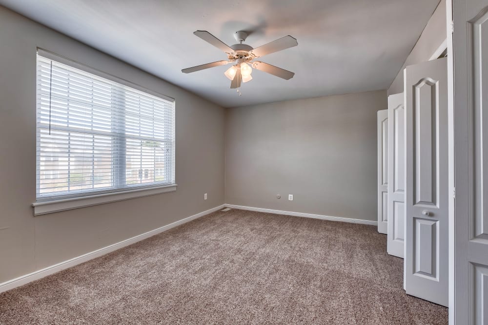 Bedroom with ceiling fan and carpet at in Virginia Beach, Virginia