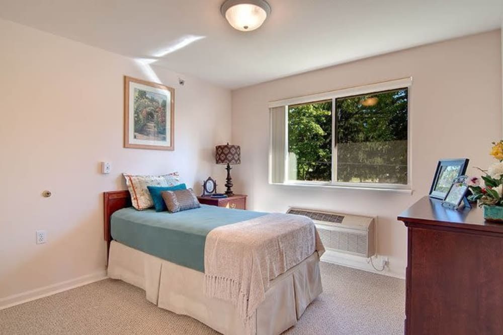 Model bedroom with twin bed at Brentwood at Niles in Niles, Michigan