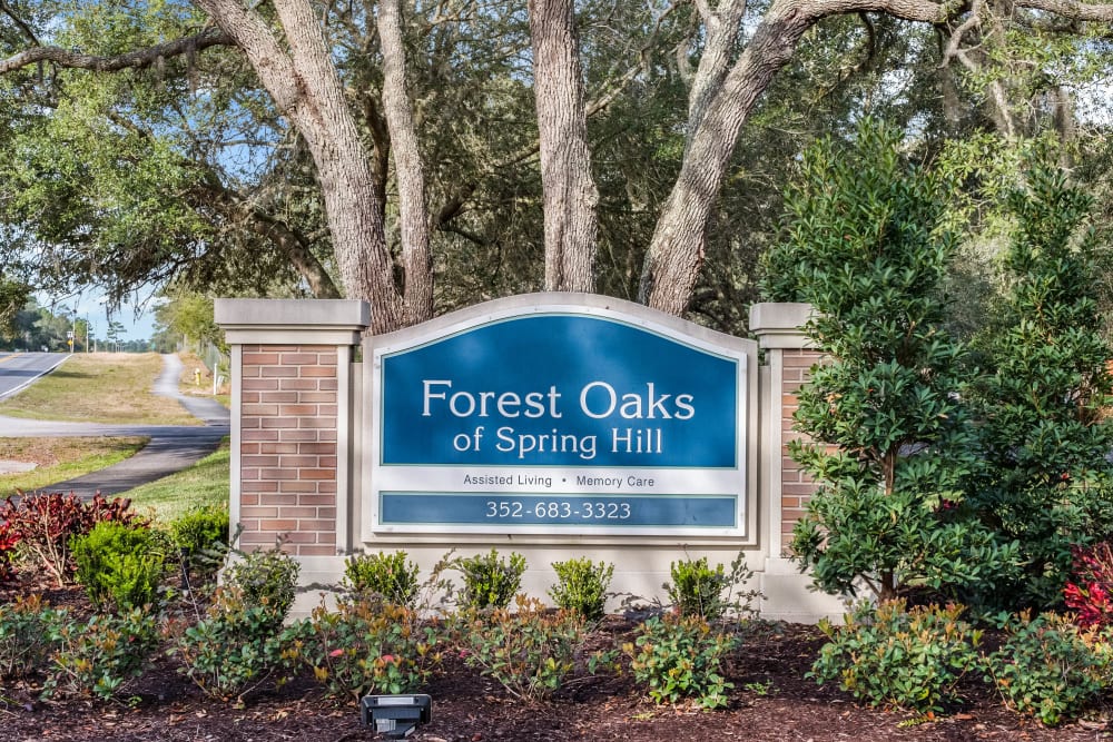 Exterior signage at Forest Oaks of Spring Hill