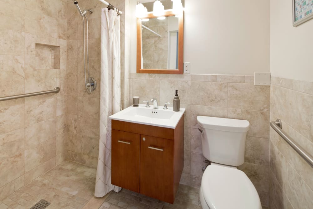 Resident Bathroom with walk in shower at Meridian at Bella Mar
