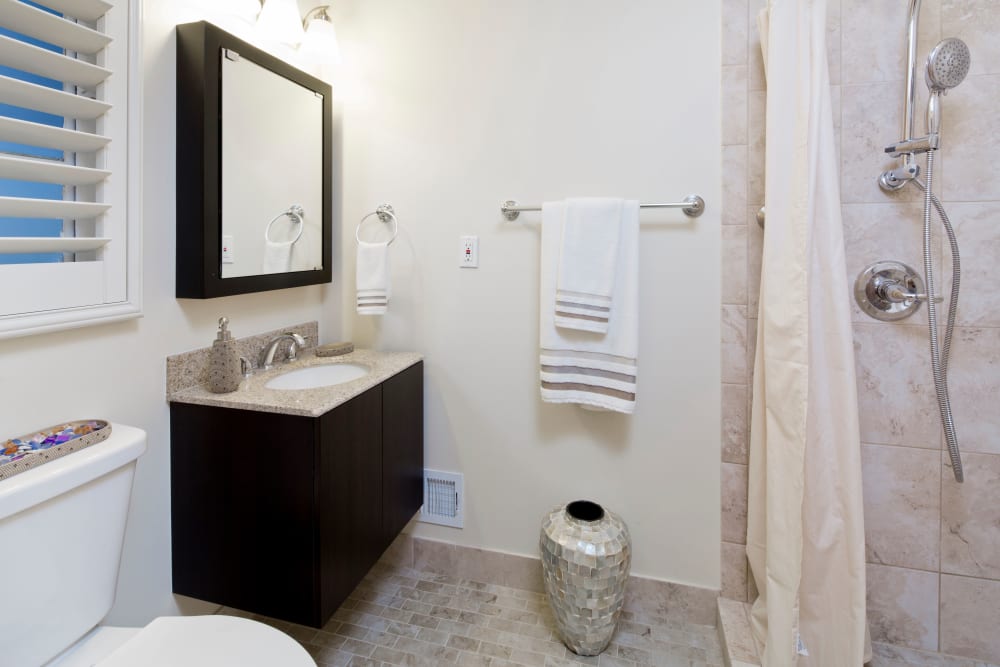 Resident Bathroom with walk in shower at Meridian at Bella Mar