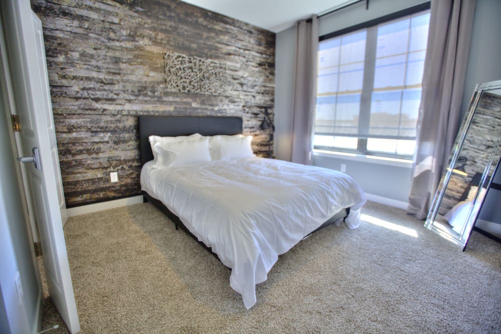 Modern, bright bedroom at Steelyard in St. Louis, Missouri