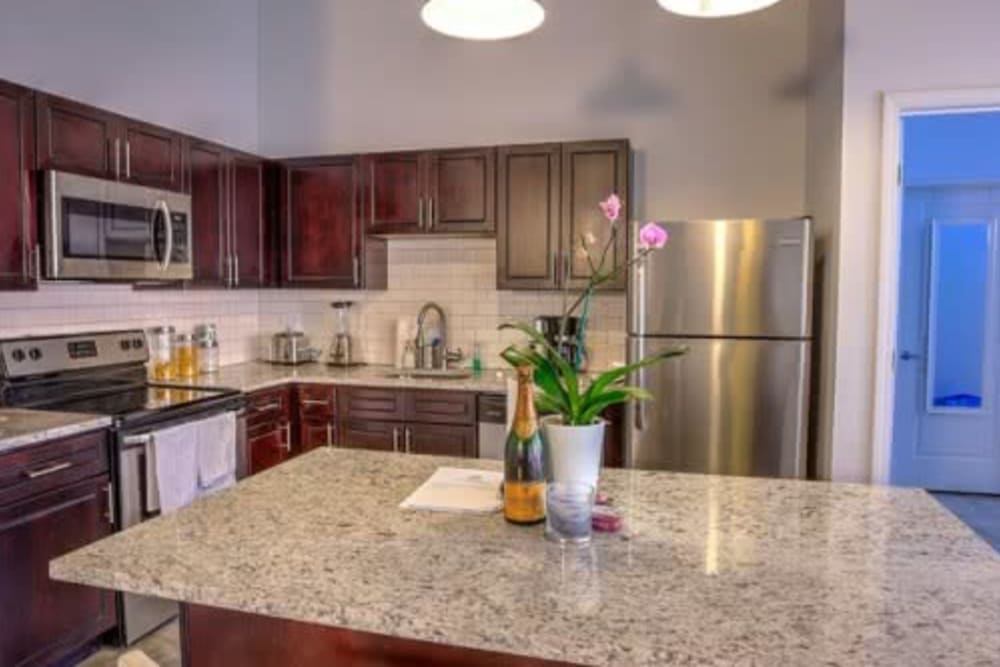 Kitchen with granite counters at Steelyard in St. Louis, Missouri