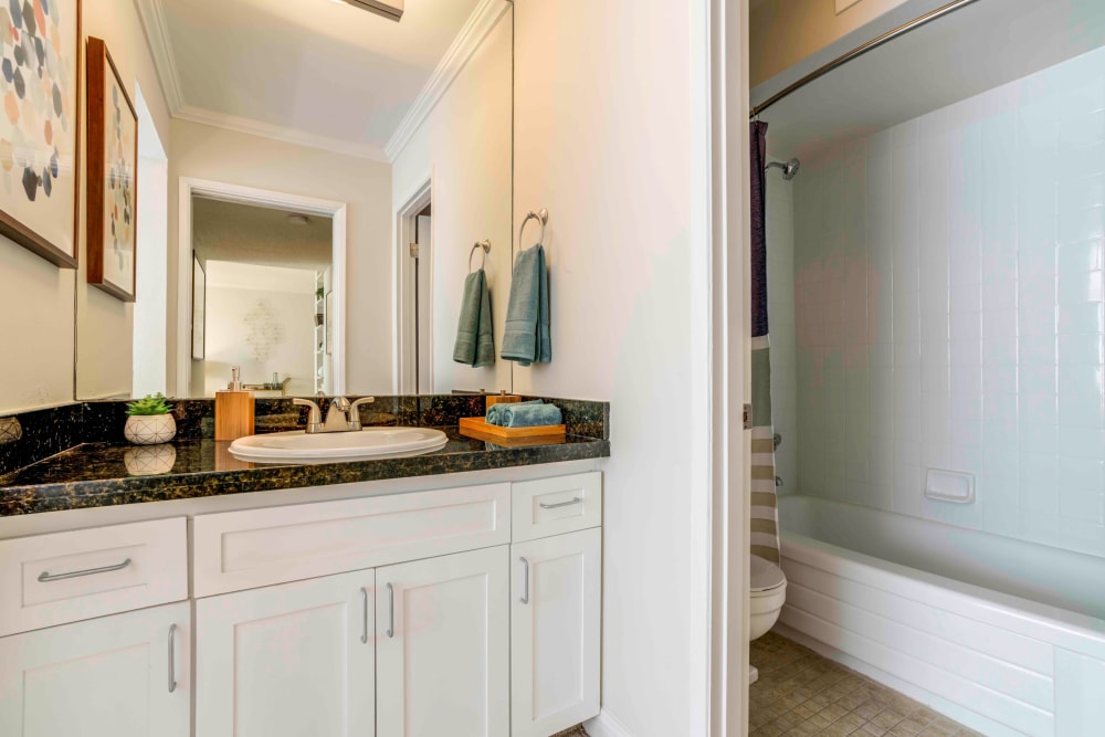 Black granite counter-top in a model home's bathroom at Sofi Redwood Park in Redwood City, California