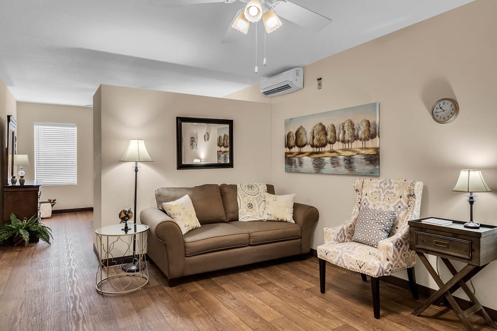 Model living room at {location_name}} in Brooksville, Florida