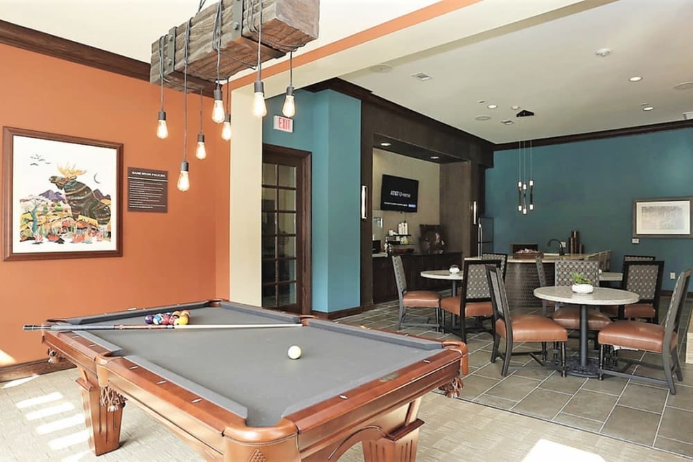 Billiards room with table and chairs at Trails at Lake Houston in Houston, Texas