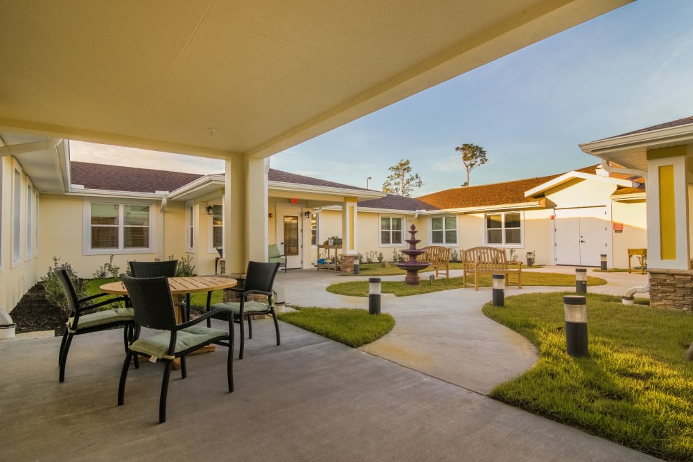 Covered porch at CERTUS Premier Memory Care Living in Vero Beach, Florida. 