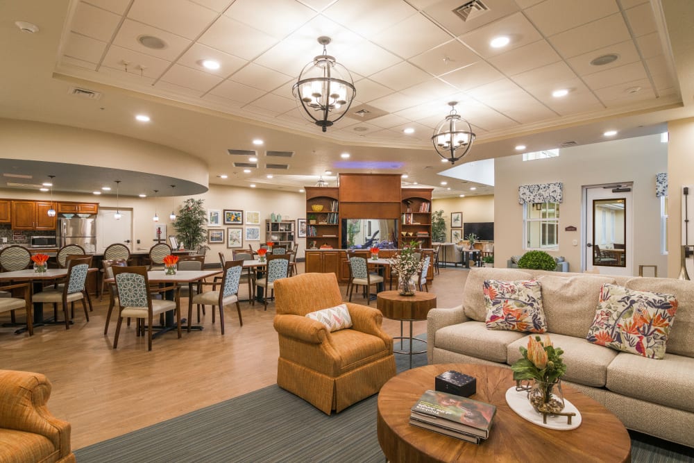 Lobby and dining area at CERTUS Premier Memory Care Living in Vero Beach, Florida. 