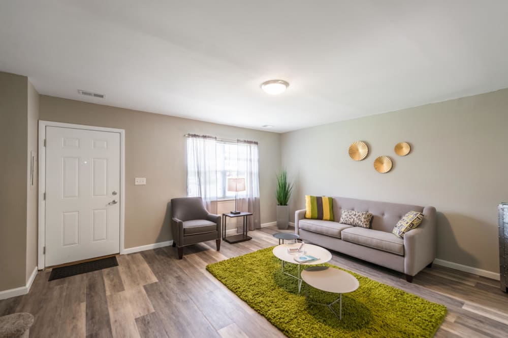 An inviting living room in a a model apartment at The Springs in Parkville, Maryland