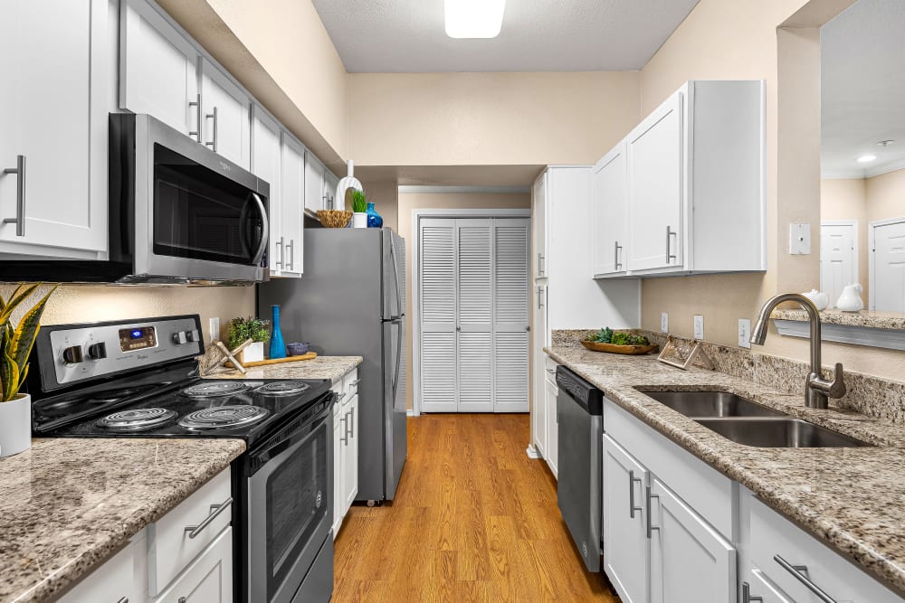 Kitchen with stainless steel appliances at The Lodge at Shavano Park