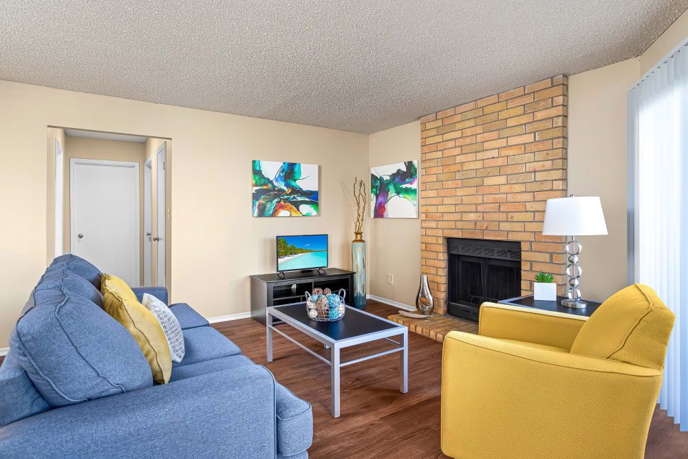 Living Room with fireplace at Stoneybrook Apartments and Townhomes