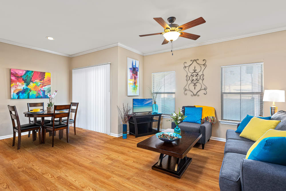 Living room with view of dining room at Villas at Medical Center