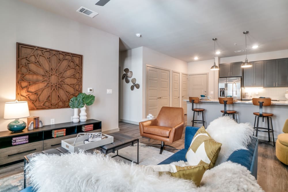 Bright well decorated living room at One90 Firewheel in Garland, Texas