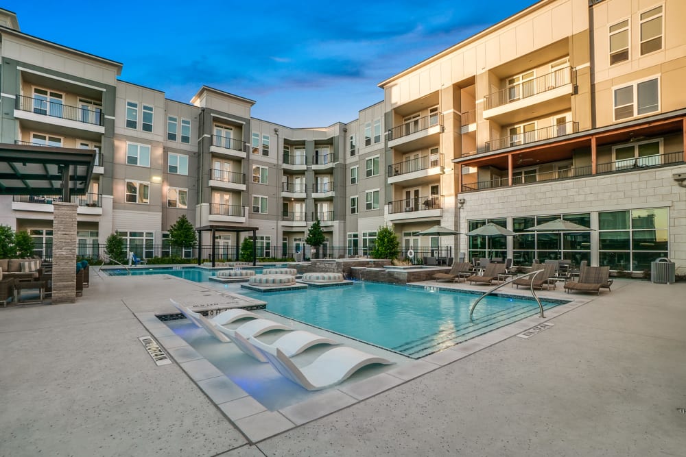 Resort-style swimming pool at One90 Firewheel in Garland, Texas