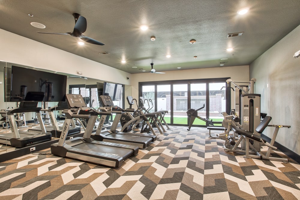 Fully equipped fitness center at Two99 Monroe in Roanoke, Texas