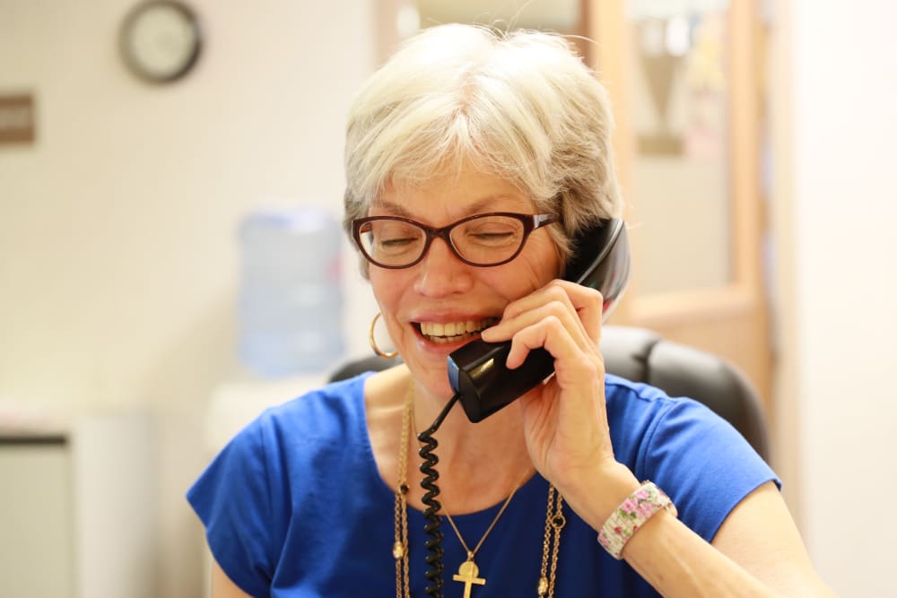 Management taking a call at Randall Residence of Decatur in Decatur, Illinois