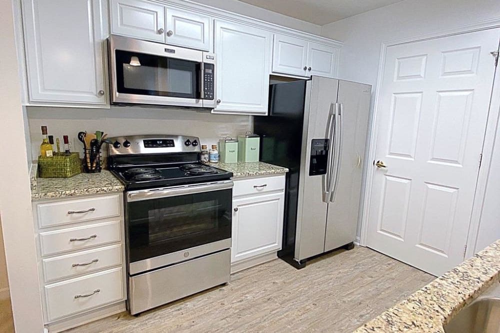 Kitchen with stainless steel appliances at Glade Creek Apartments in Roanoke, Virginia