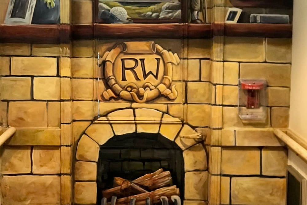 Painted fireplace wall mural at Ramsey Woods in Cudahy, Wisconsin.
