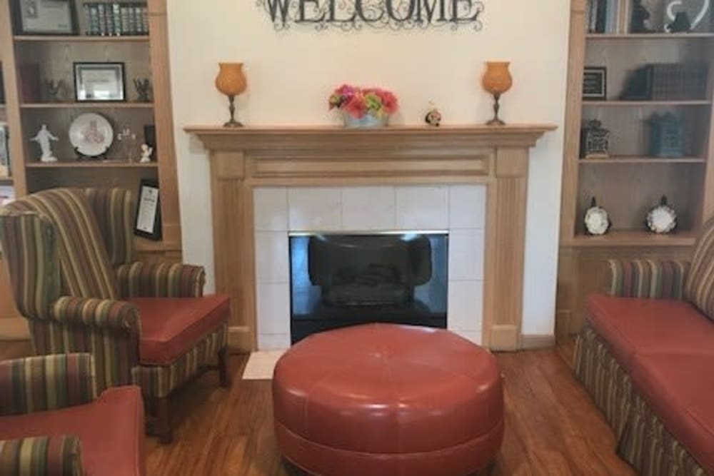 Community room with fireplace at Ramsey Woods in Cudahy, Wisconsin.