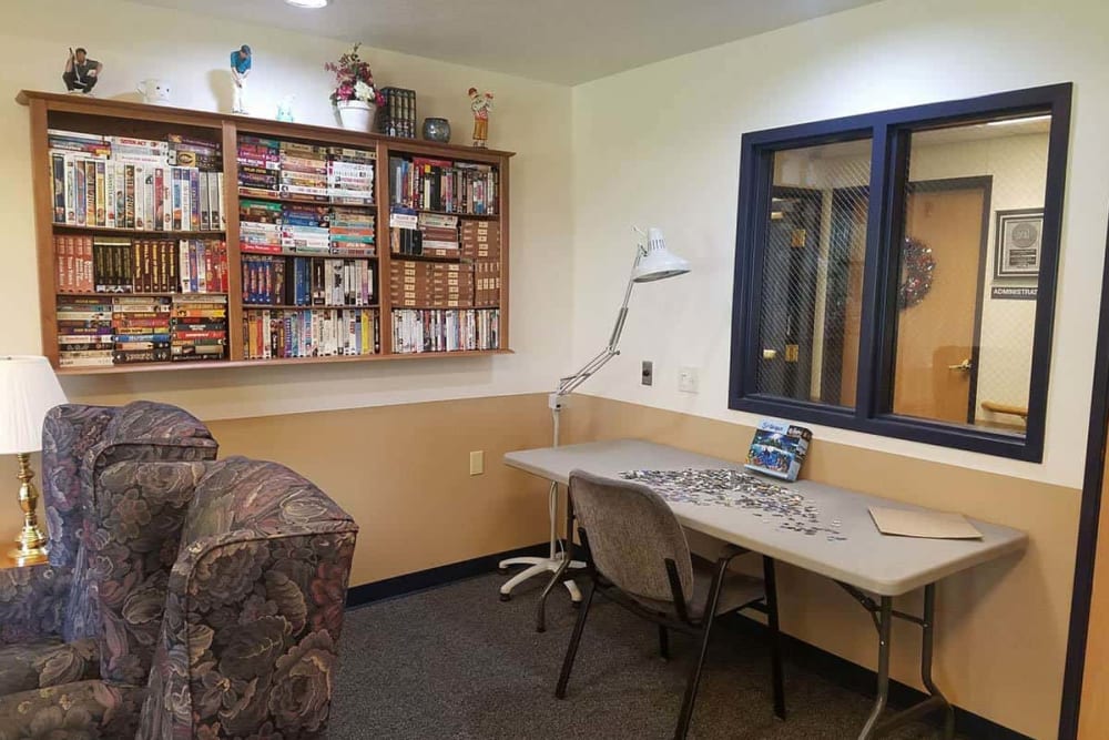 Activity room with books and puzzles at Holstein Senior Living in Holstein, Iowa. 