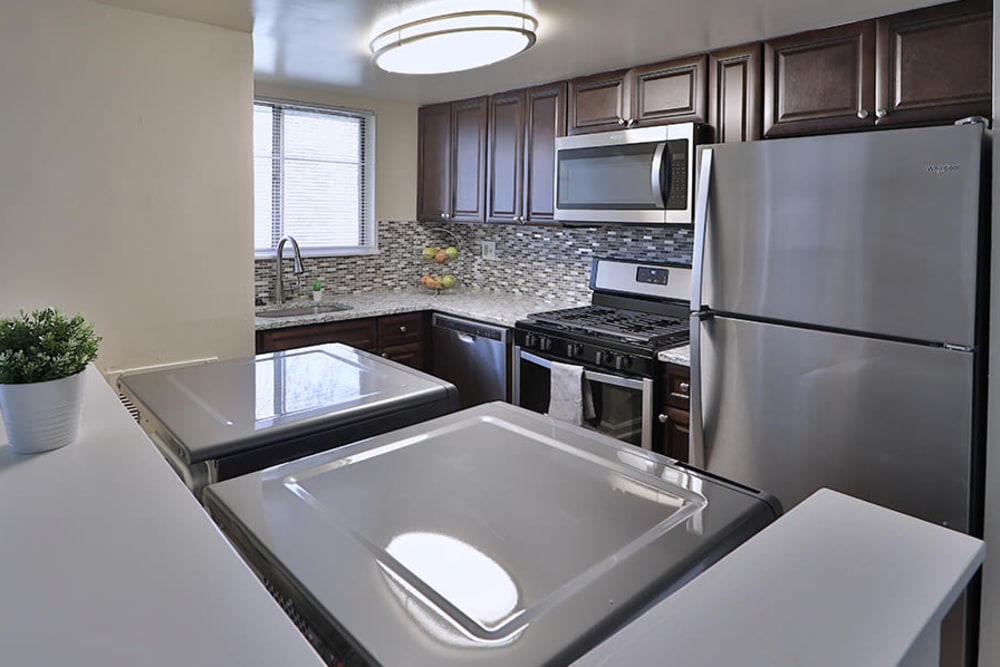Kitchen with Modern Appliances at Princeton Estates Apartment Homes in Temple Hills, Maryland